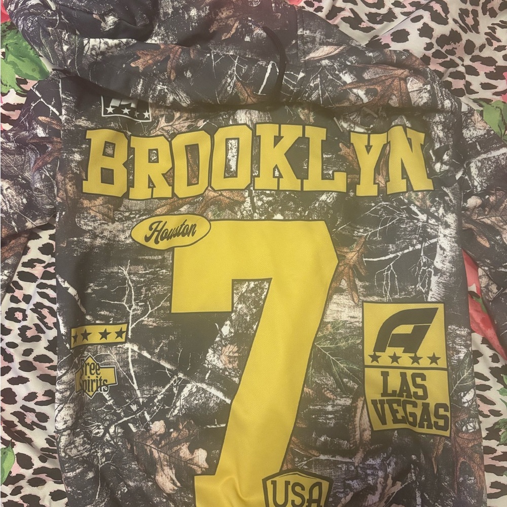 Brooklyn Camouflage Graphic Hoodie with Yellow Accents